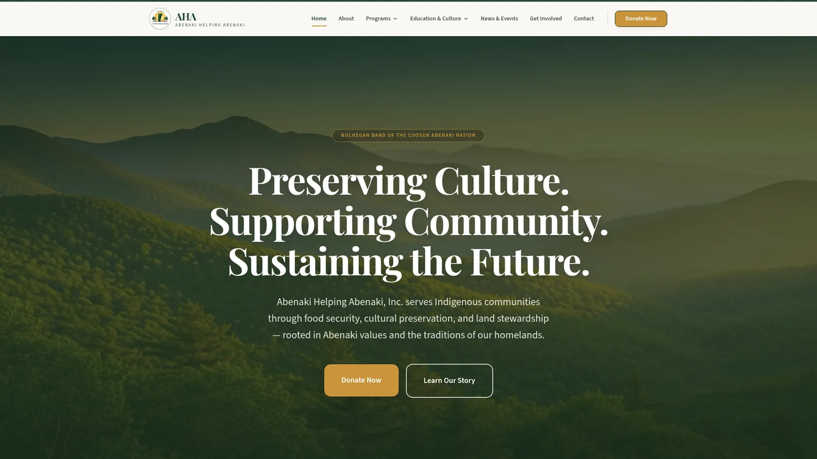 Abenaki Helping Abenaki website homepage with a mountain landscape